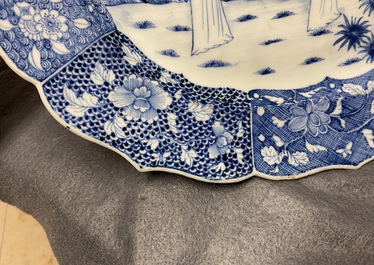 A large oval Chinese blue and white 'Romance of the Western Chamber' dish, Qianlong